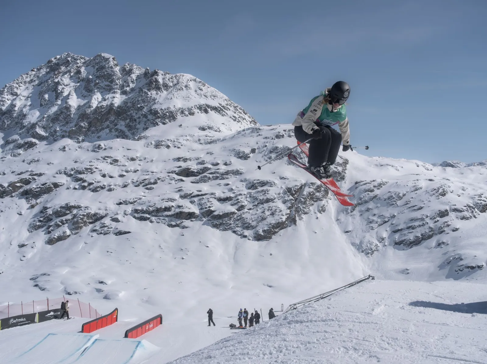 Dynamic shot of an athlete snowboarding in Sils im Engadin/Segl, showcasing thrilling alpine sports.